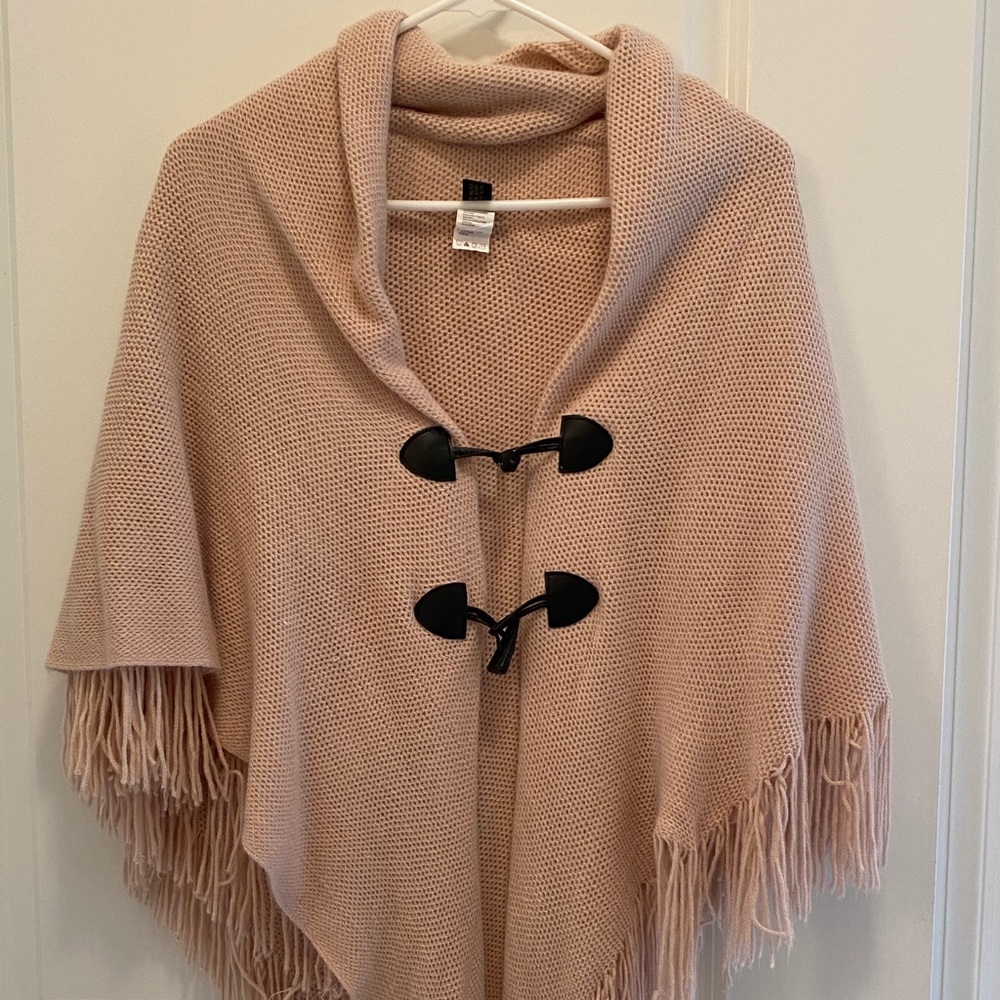 Pink sweater poncho